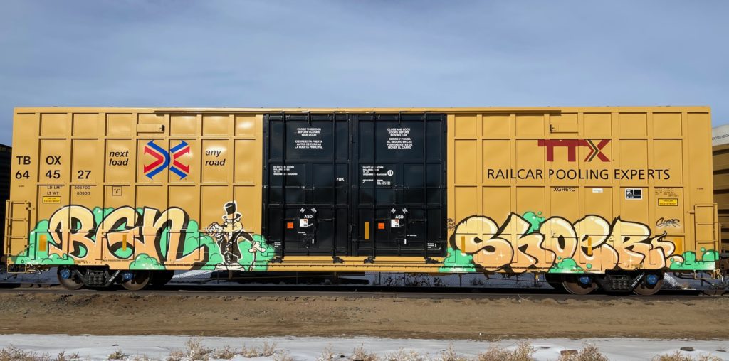 Graffiti on a new TBOX with high number by TKO's Bgn and Shoe